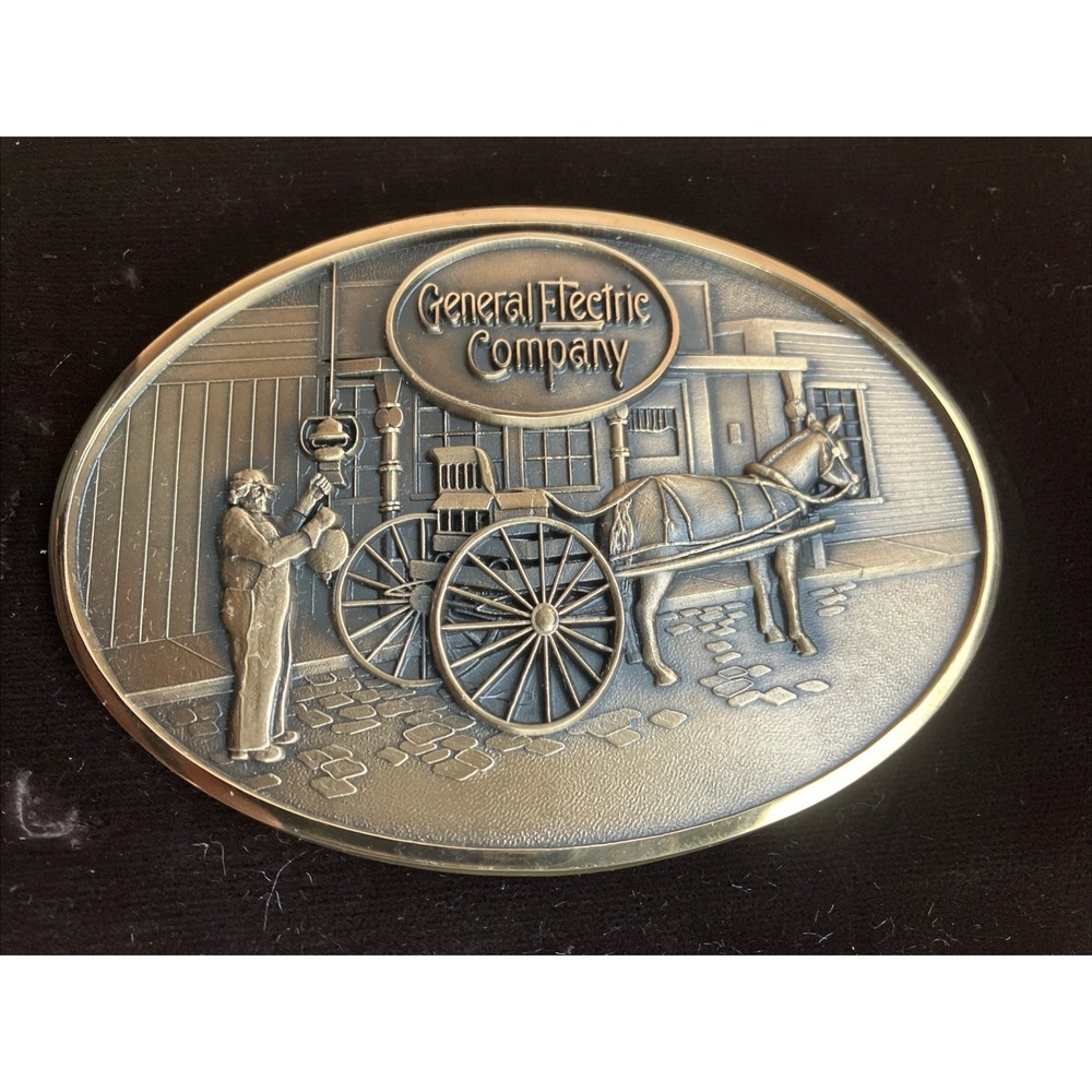 Vintage 80s General Electric Company Turn of the Century Lamplighter Belt Buckle